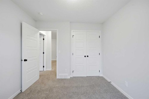156 Seton Villas Se, Calgary, AB - Indoor Photo Showing Other Room
