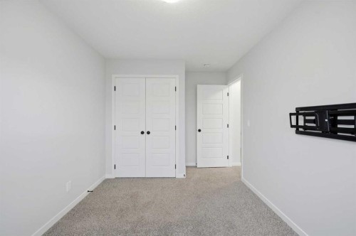 156 Seton Villas Se, Calgary, AB - Indoor Photo Showing Other Room