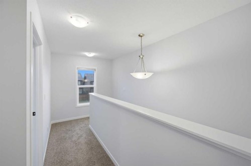 156 Seton Villas Se, Calgary, AB - Indoor Photo Showing Other Room