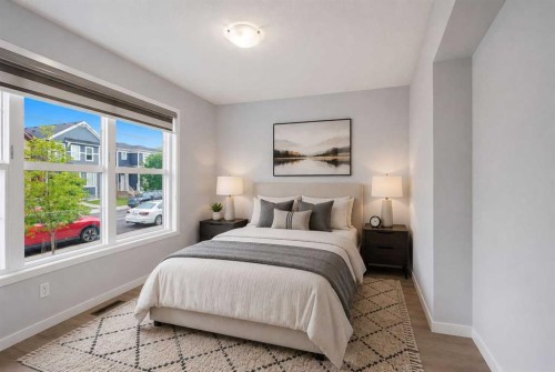 156 Seton Villas Se, Calgary, AB - Indoor Photo Showing Bedroom