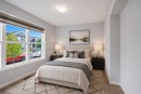 156 Seton Villas Se, Calgary, AB  - Indoor Photo Showing Bedroom 