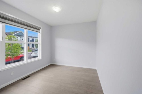 156 Seton Villas Se, Calgary, AB - Indoor Photo Showing Other Room