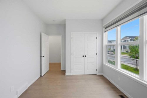 156 Seton Villas Se, Calgary, AB - Indoor Photo Showing Other Room