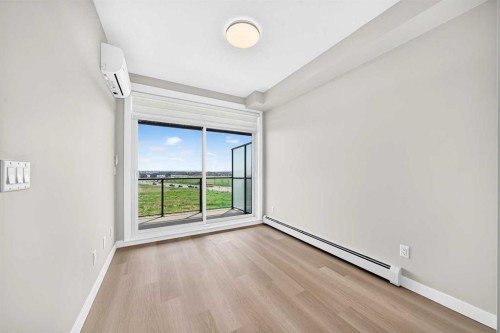 1409-3700 Seton Avenue Se, Calgary, AB - Indoor Photo Showing Other Room