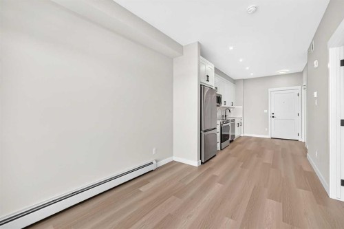 1409-3700 Seton Avenue Se, Calgary, AB - Indoor Photo Showing Other Room