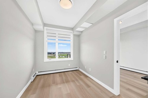 1409-3700 Seton Avenue Se, Calgary, AB - Indoor Photo Showing Other Room