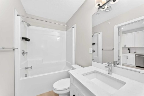 1409-3700 Seton Avenue Se, Calgary, AB - Indoor Photo Showing Bathroom