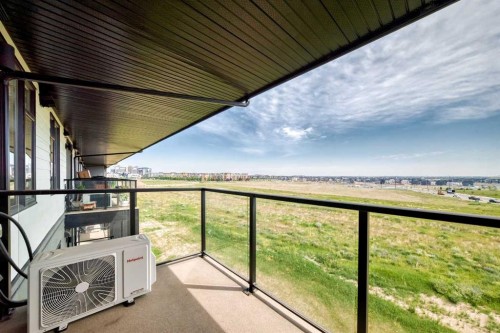 1409-3700 Seton Avenue Se, Calgary, AB - Outdoor With Balcony With View With Exterior