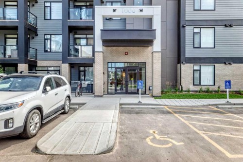 1409-3700 Seton Avenue Se, Calgary, AB - Outdoor With Balcony With Facade