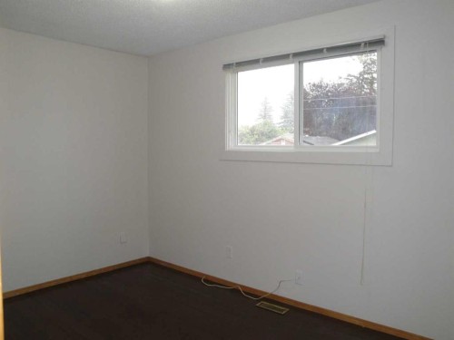31 Huntford Road Ne, Calgary, AB - Indoor Photo Showing Other Room