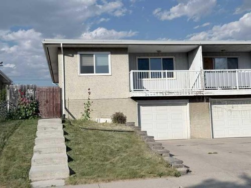 31 Huntford Road Ne, Calgary, AB - Outdoor With Balcony