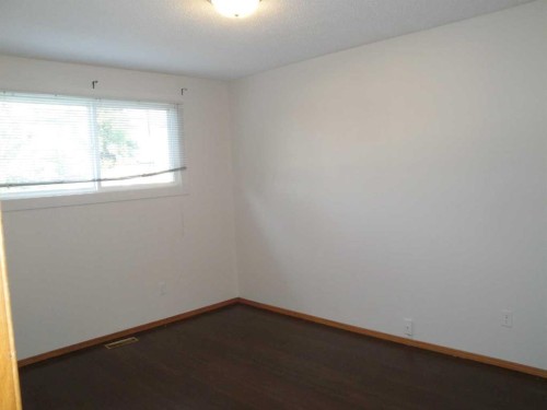 31 Huntford Road Ne, Calgary, AB - Indoor Photo Showing Other Room