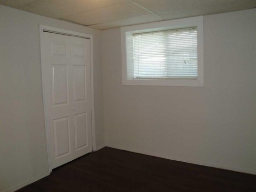31 Huntford Road Ne, Calgary, AB - Indoor Photo Showing Other Room