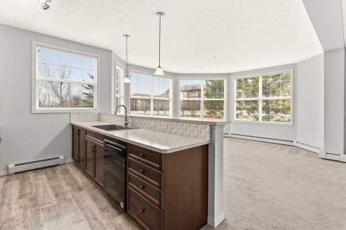 137-1 Crystal Green Lane, Okotoks, AB - Indoor Photo Showing Kitchen