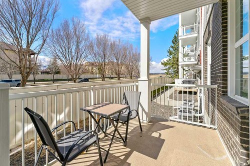 137-1 Crystal Green Lane, Okotoks, AB - Outdoor With Deck Patio Veranda