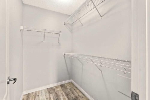 137-1 Crystal Green Lane, Okotoks, AB - Indoor With Storage