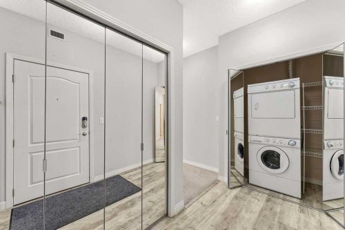 137-1 Crystal Green Lane, Okotoks, AB - Indoor Photo Showing Laundry Room