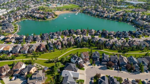 137-1 Crystal Green Lane, Okotoks, AB - Outdoor With Body Of Water With View