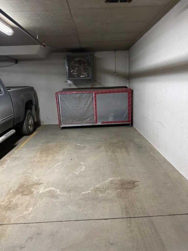 137-1 Crystal Green Lane, Okotoks, AB - Indoor Photo Showing Garage