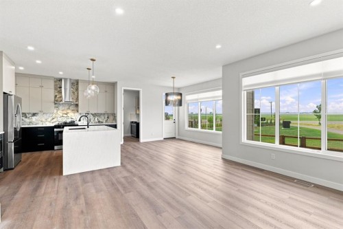 40 Fieldstone Close, Balzac, AB - Indoor Photo Showing Kitchen With Upgraded Kitchen