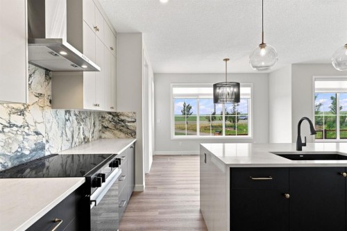 40 Fieldstone Close, Balzac, AB - Indoor Photo Showing Kitchen With Upgraded Kitchen