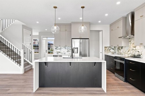 40 Fieldstone Close, Balzac, AB - Indoor Photo Showing Kitchen With Upgraded Kitchen