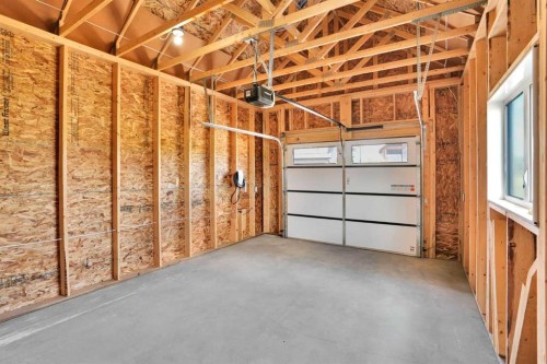 35 Cottageclub Lane, Rural Rocky View County, AB - Indoor Photo Showing Garage
