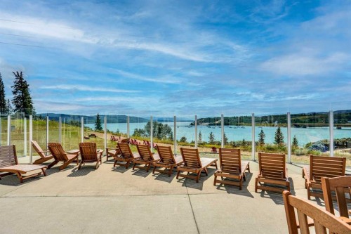 35 Cottageclub Lane, Rural Rocky View County, AB - Outdoor With Body Of Water With Deck Patio Veranda With View