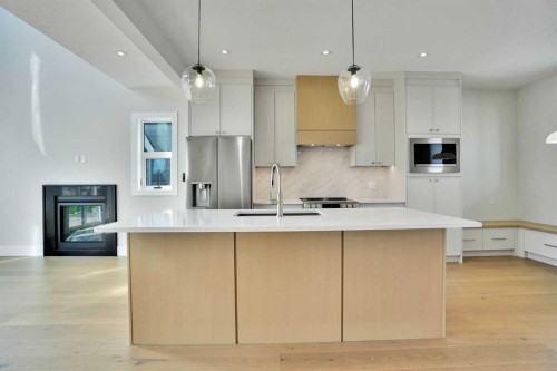35 Cottageclub Lane, Rural Rocky View County, AB - Indoor Photo Showing Kitchen With Upgraded Kitchen