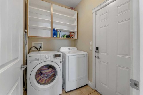 134 Channelside Cove Sw, Airdrie, AB - Indoor Photo Showing Laundry Room