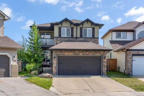 134 Channelside Cove Sw, Airdrie, AB - Outdoor With Facade