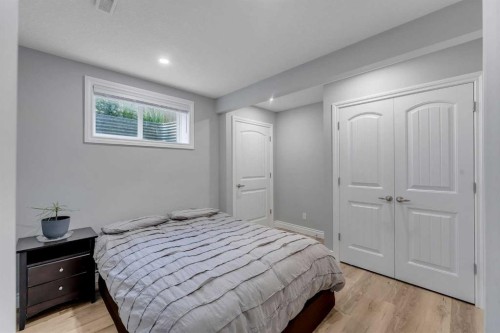 134 Channelside Cove Sw, Airdrie, AB - Indoor Photo Showing Bedroom