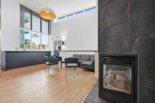 1505-1410 1 Street Se, Calgary, AB - Indoor With Fireplace