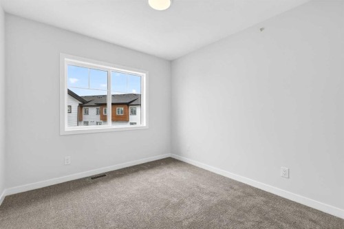 206-28 Red Embers Plaza Ne, Calgary, AB - Indoor Photo Showing Other Room