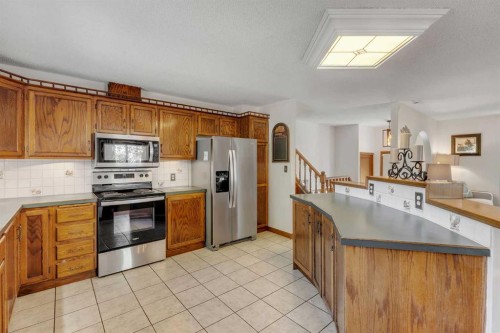 36 Mckerrell Court Se, Calgary, AB - Indoor Photo Showing Kitchen