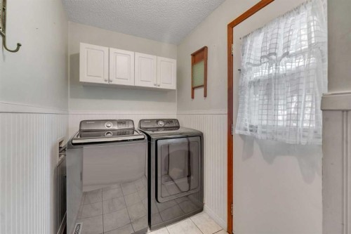 36 Mckerrell Court Se, Calgary, AB - Indoor Photo Showing Laundry Room