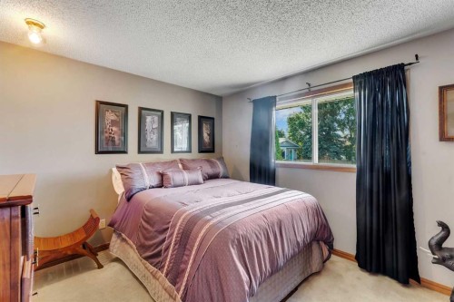 36 Mckerrell Court Se, Calgary, AB - Indoor Photo Showing Bedroom