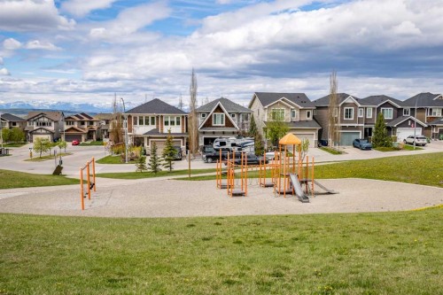 128 Sunset Park, Cochrane, AB - Outdoor With Facade