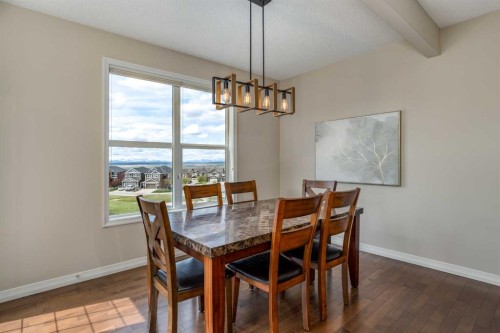 128 Sunset Park, Cochrane, AB - Indoor Photo Showing Dining Room