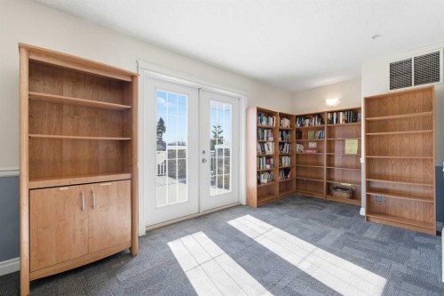 103-128 Centre Avenue, Cochrane, AB - Indoor Photo Showing Other Room