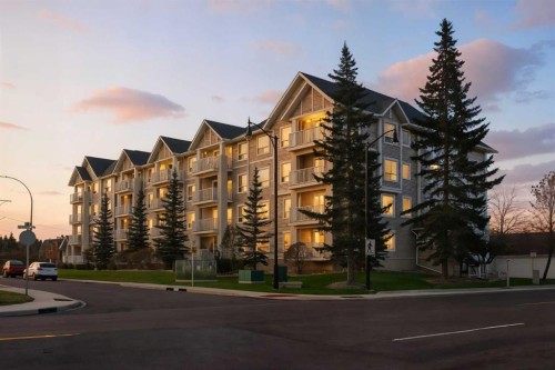 103-128 Centre Avenue, Cochrane, AB - Outdoor With Facade