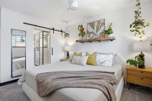 180 Huntford Road Ne, Calgary, AB - Indoor Photo Showing Bedroom