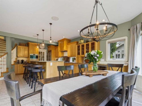 126 West Terrace Point, Cochrane, AB - Indoor Photo Showing Dining Room