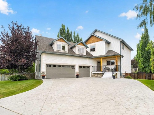 126 West Terrace Point, Cochrane, AB - Outdoor With Facade