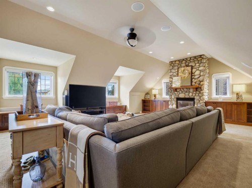 126 West Terrace Point, Cochrane, AB - Indoor Photo Showing Living Room With Fireplace