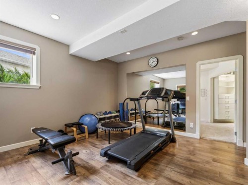 126 West Terrace Point, Cochrane, AB - Indoor Photo Showing Gym Room