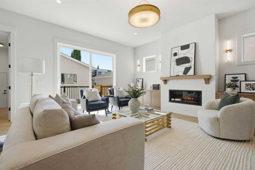 2131 29 Avenue Sw, Calgary, AB - Indoor Photo Showing Living Room With Fireplace