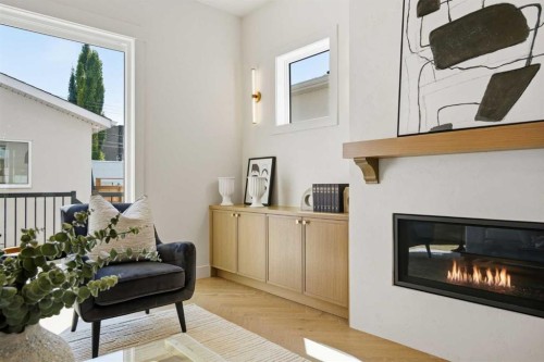 2131 29 Avenue Sw, Calgary, AB - Indoor Photo Showing Living Room With Fireplace
