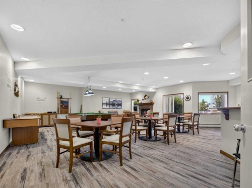 201-72 Quigley Drive, Cochrane, AB - Indoor Photo Showing Dining Room