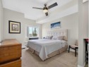201-72 Quigley Drive, Cochrane, AB  - Indoor Photo Showing Bedroom 
